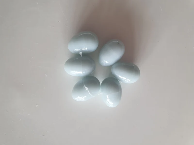 Huevos falsos de plastico canario 2cm