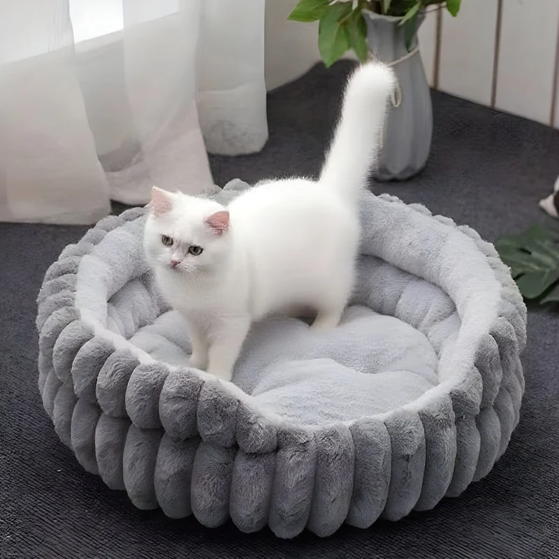 Calming donut bed with raised sides for dogs and cats