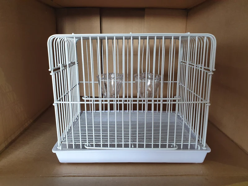 Jaula de transporte blanca 23x15.5x17