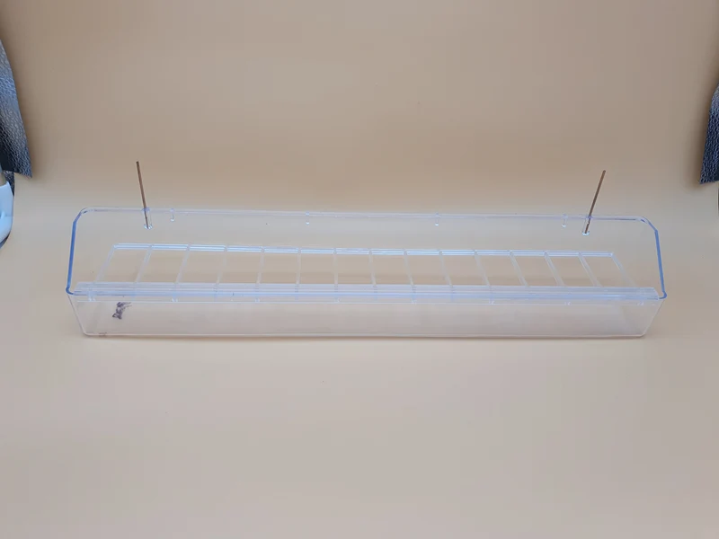 Comedero largo con ganchos transparente